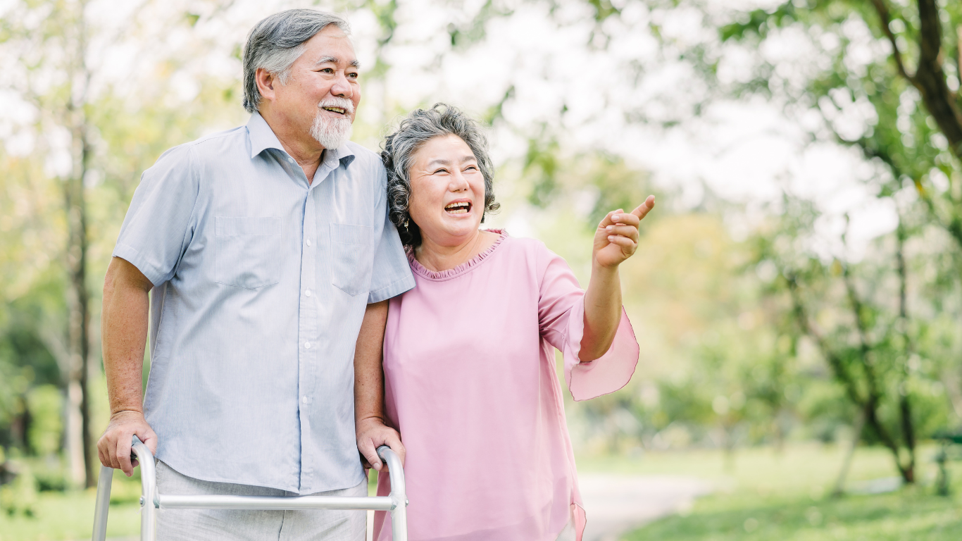 Senior couple on walk in outdoor park
