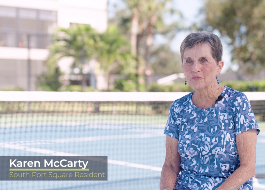 Karen McCarty, South Port Square resident, being interviewed in front of pickleball court.