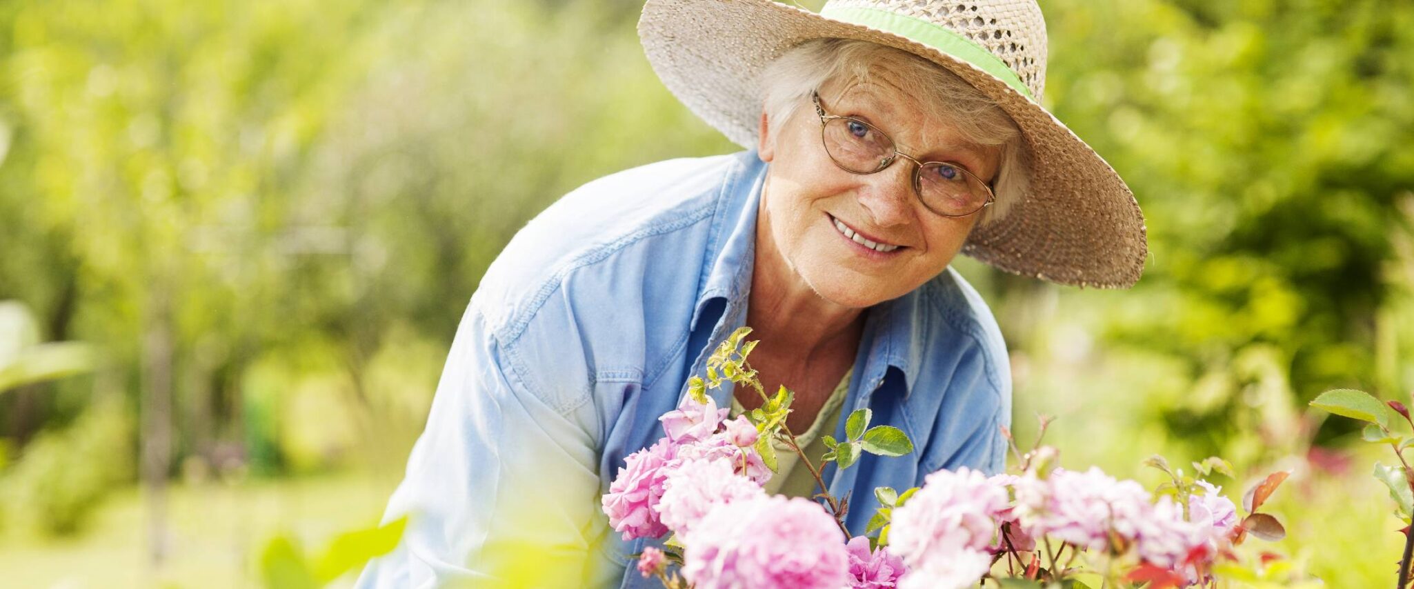 senior smiling while gardening