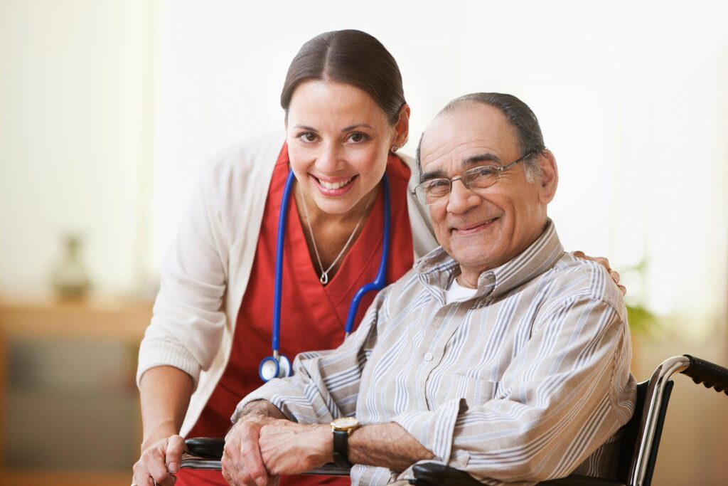 healthcare worker smiling with a resident