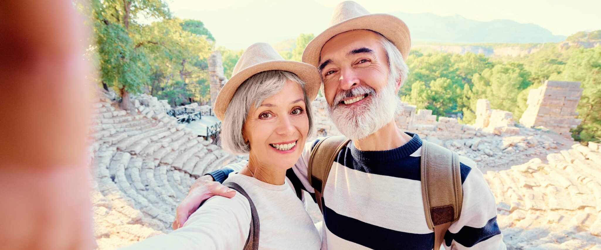 seniors traveling the world takes a selfie